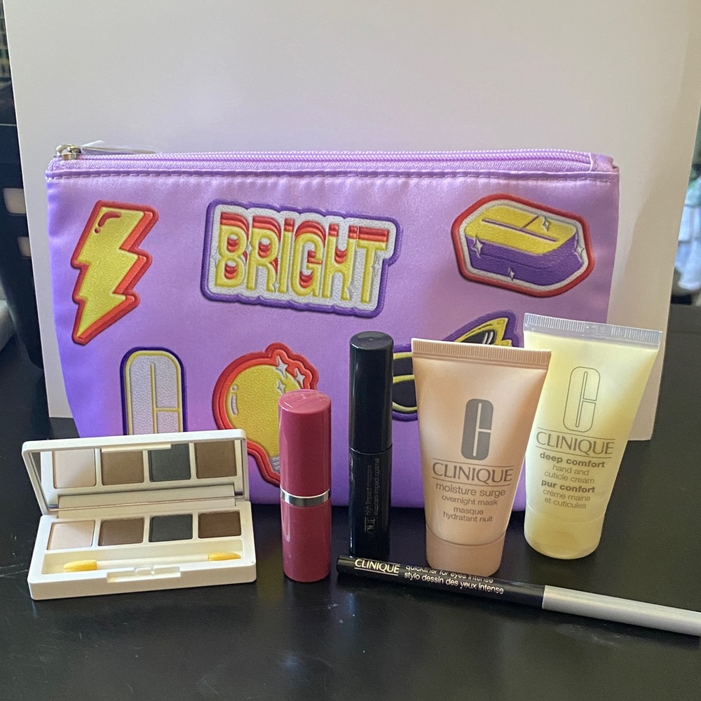 NWOT Clinique Cosmetic Collection with Colorful Clinique Make Up Bag